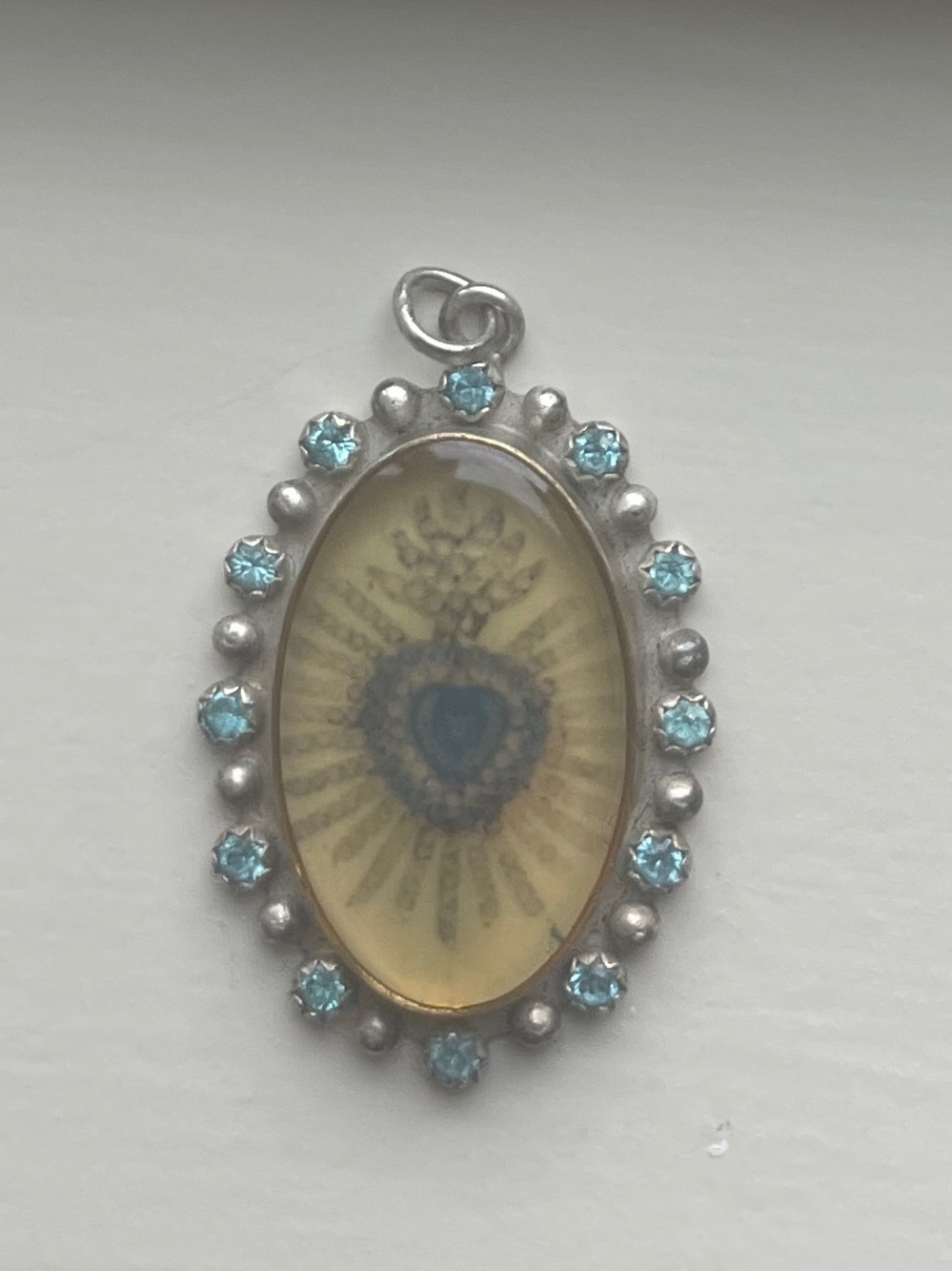 Gold-Tone Oval Sacred Heart Pendant Necklace with Green Accents